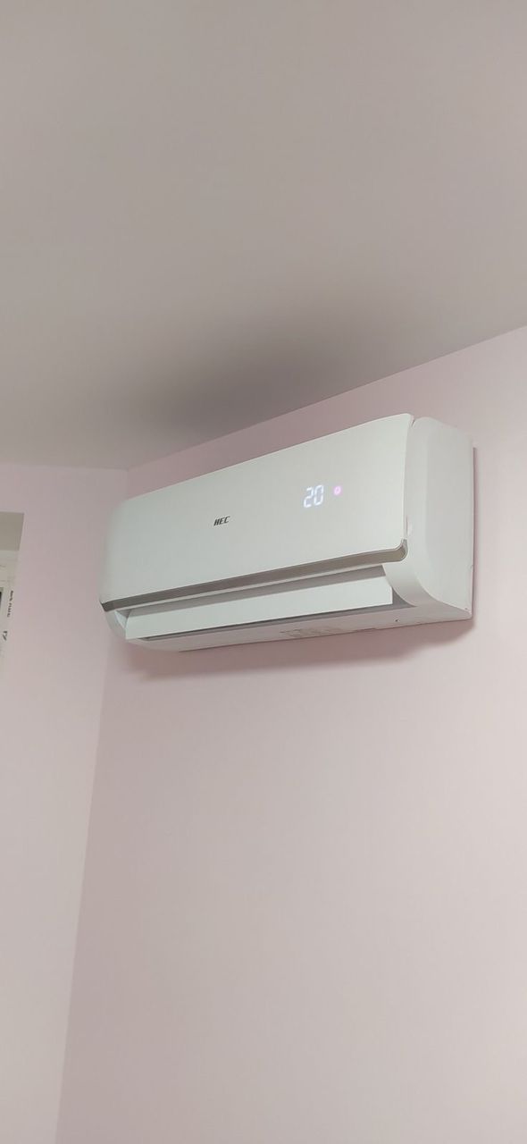 Wall-mounted air conditioning unit in modern residential living room, Harare